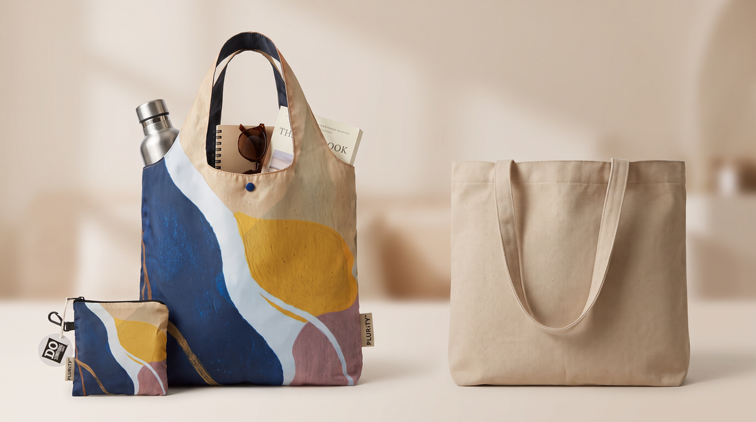 PLURiTy roll-up packable tote with coordinating pouch beside a traditional structured tote bag.